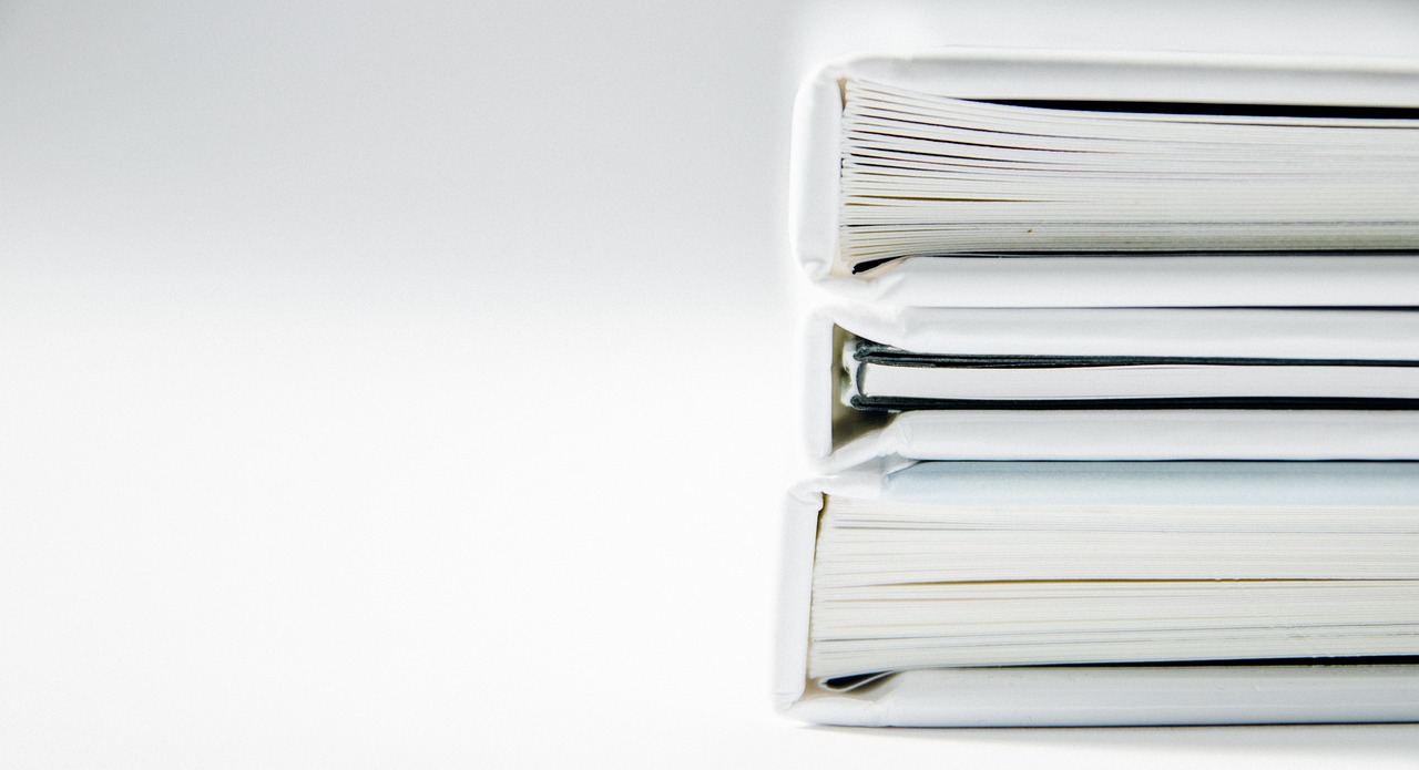 A pile of books on top of each other.