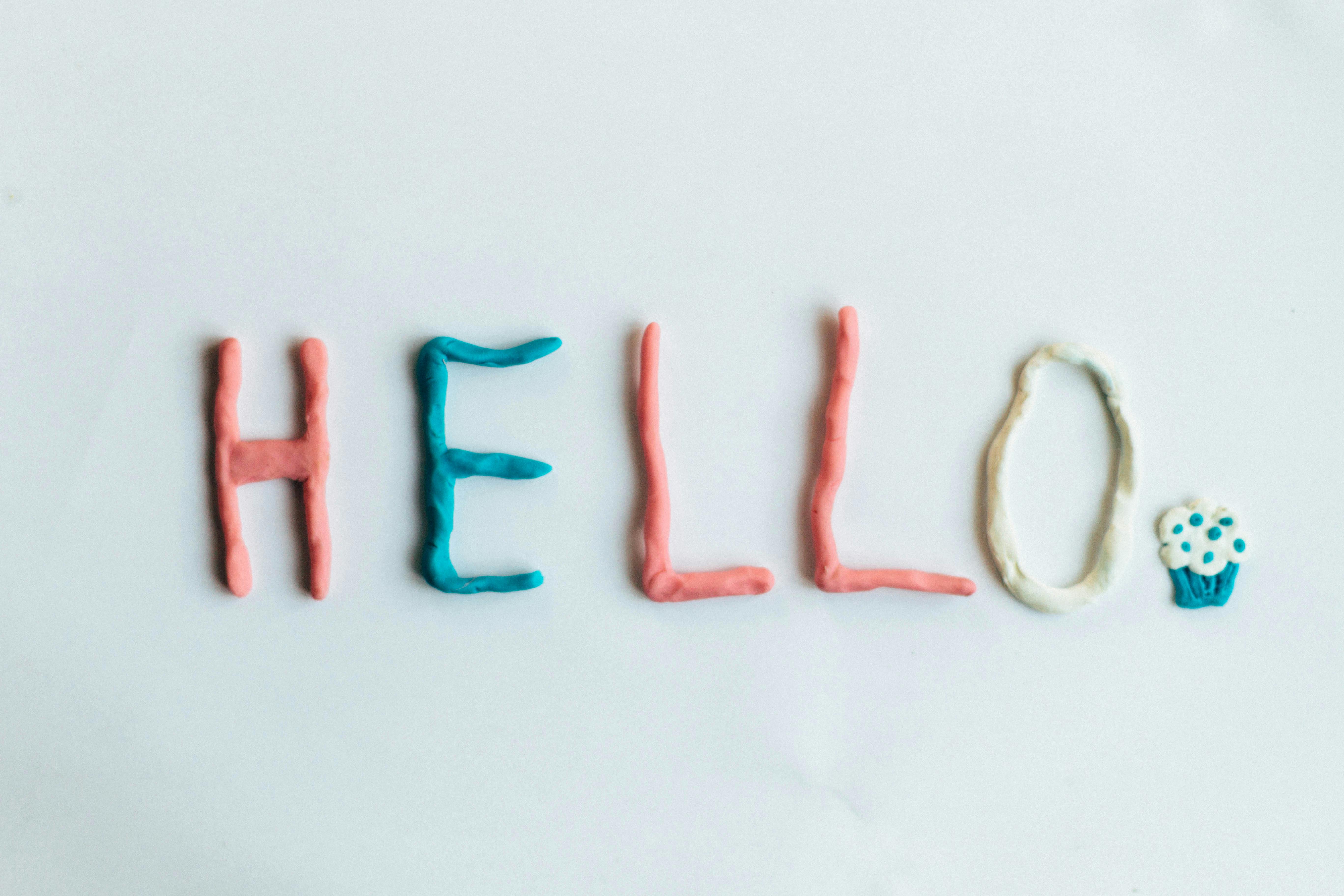 The word 'Hello' written in multi-coloured plasticine.