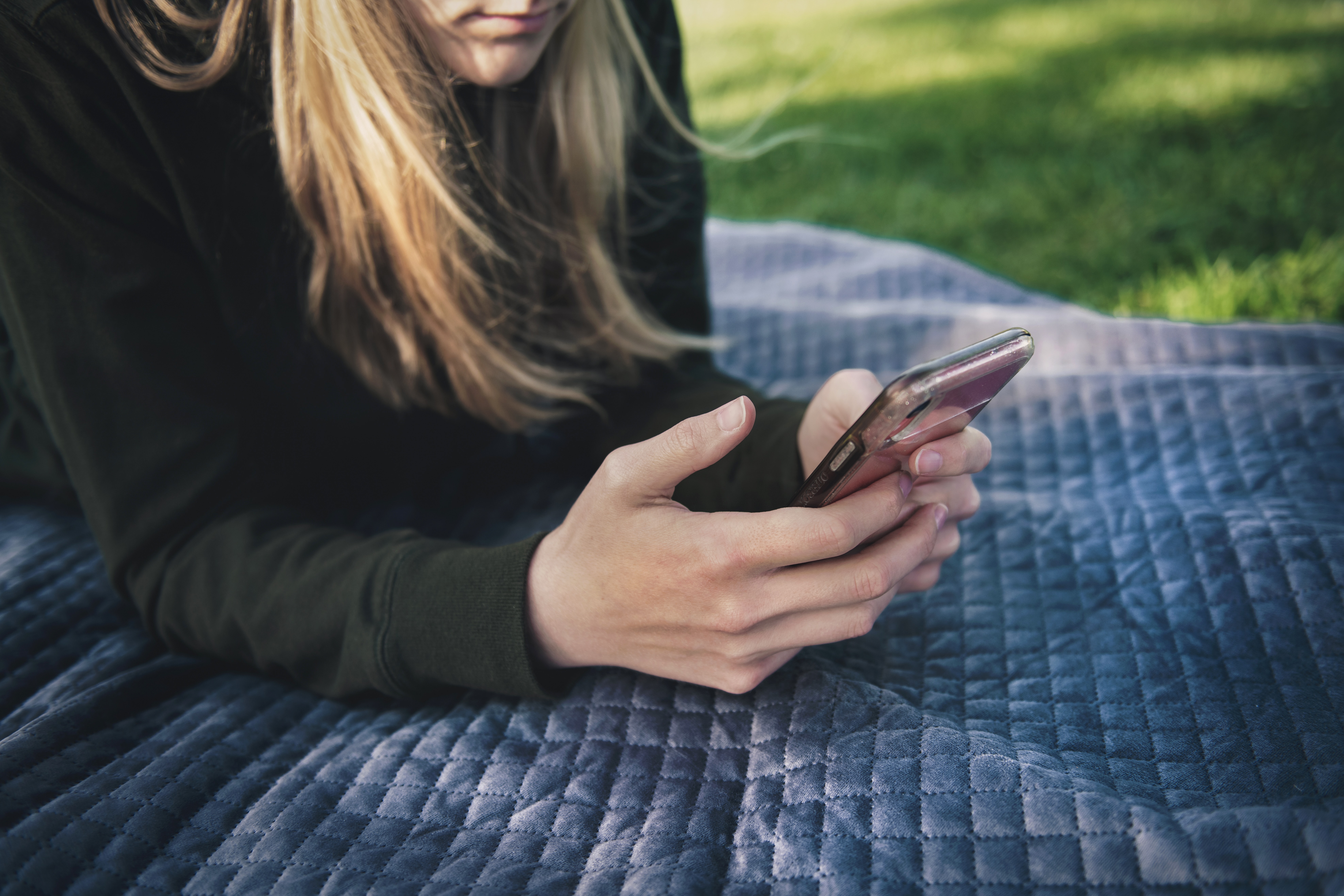 A student using her mobile phone.