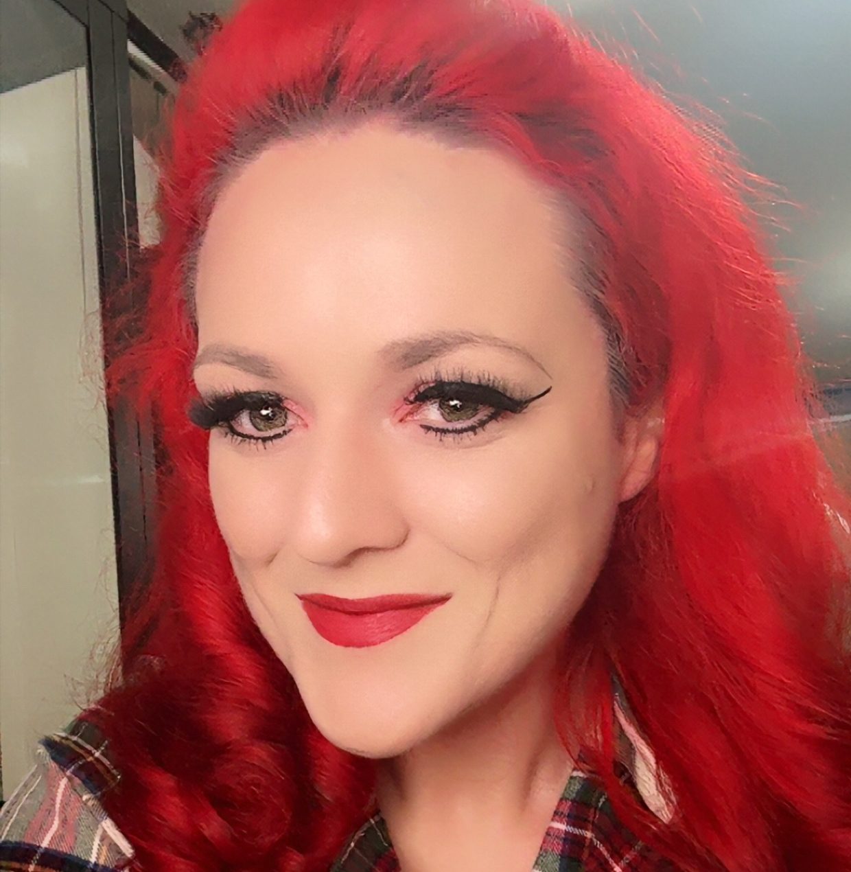 A headshot of Scarlet James.