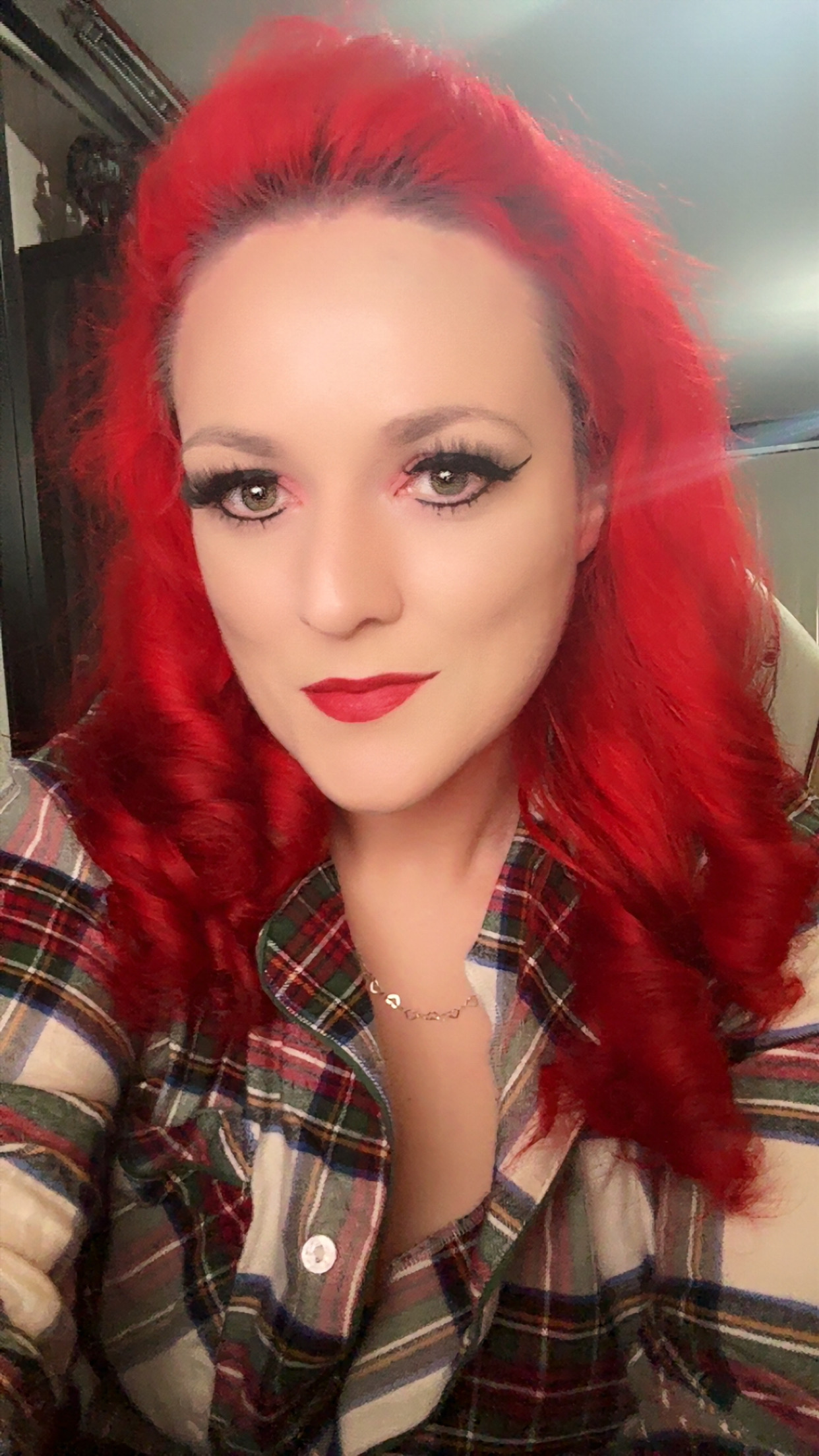 A headshot of Scarlet James.