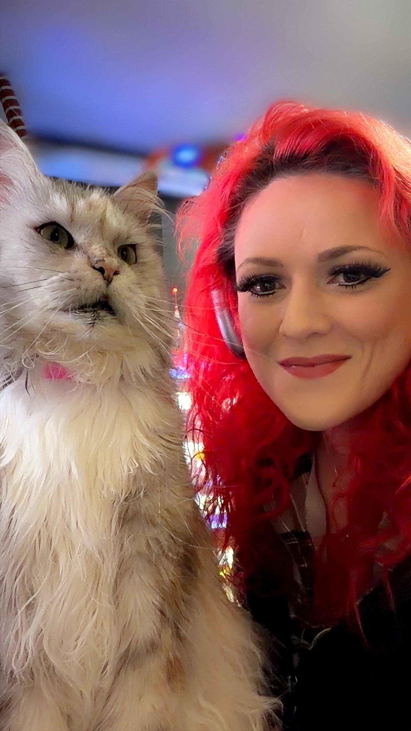 Scarlet James and her cat, Winter.